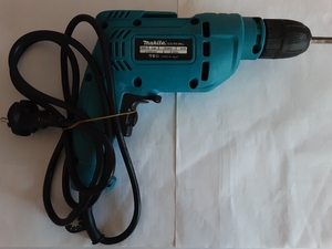 Электрическая дрель